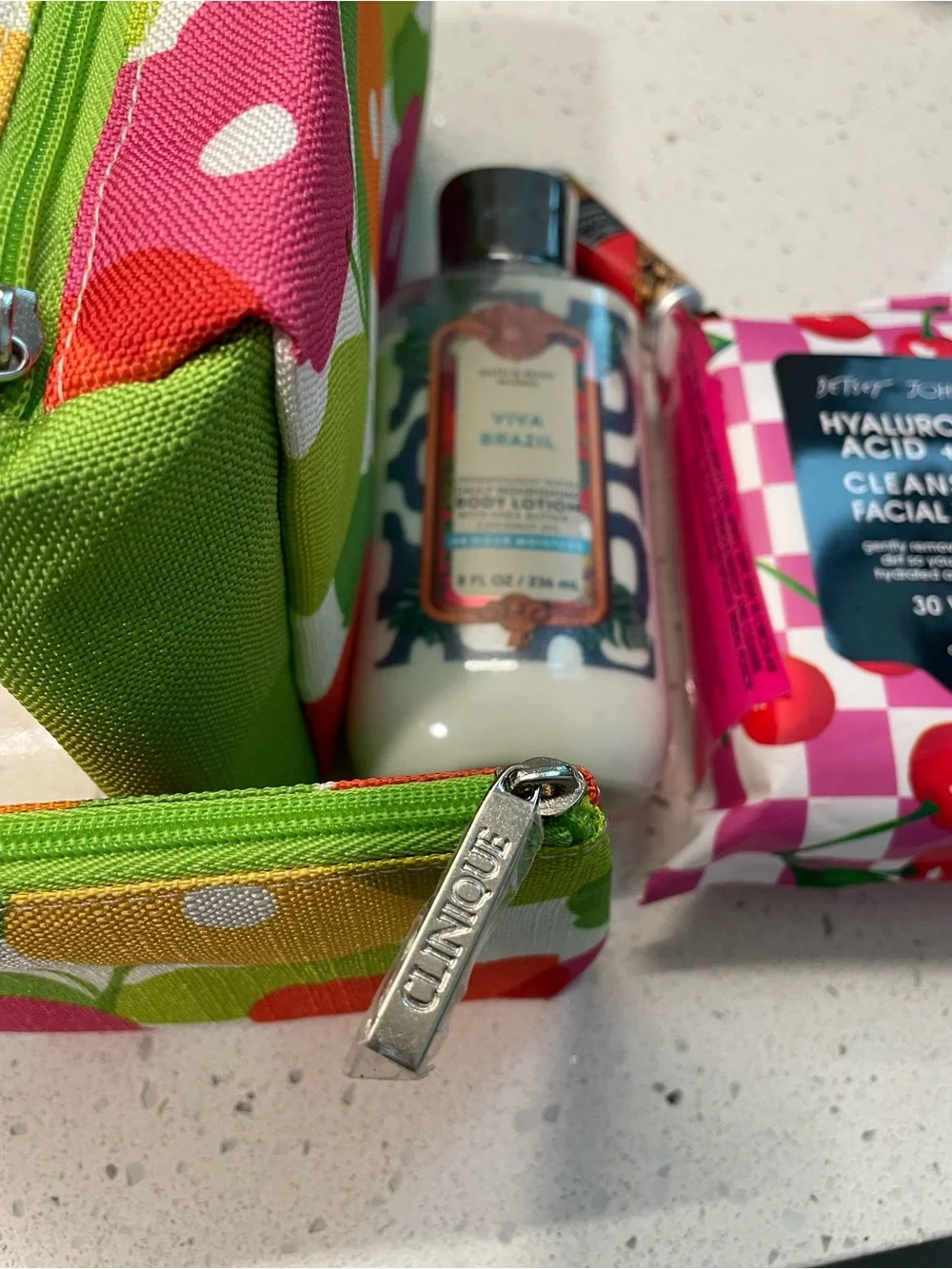 Bundle -Clinique Makeup bag, BBW lotion, Betsey Johnson face wipes, and lip balm